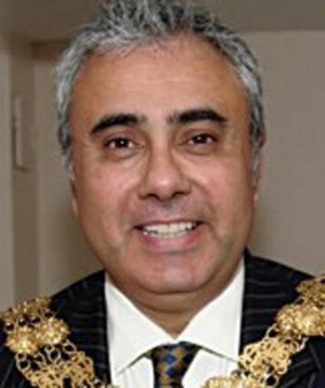 Cranfield-Adams in dark suit and mayoral chain