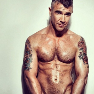 Massow shirtless with tattoos